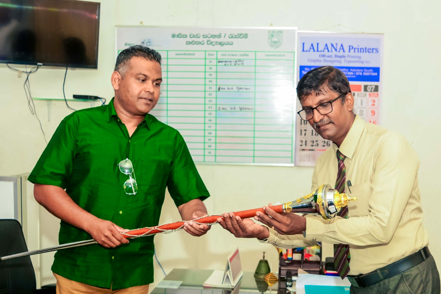 Donating a baton to the band